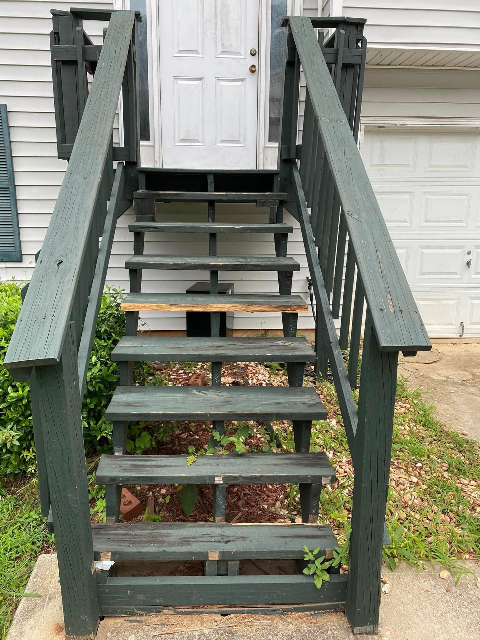 Before — deteriorating wooden entry stairs needing full replacement