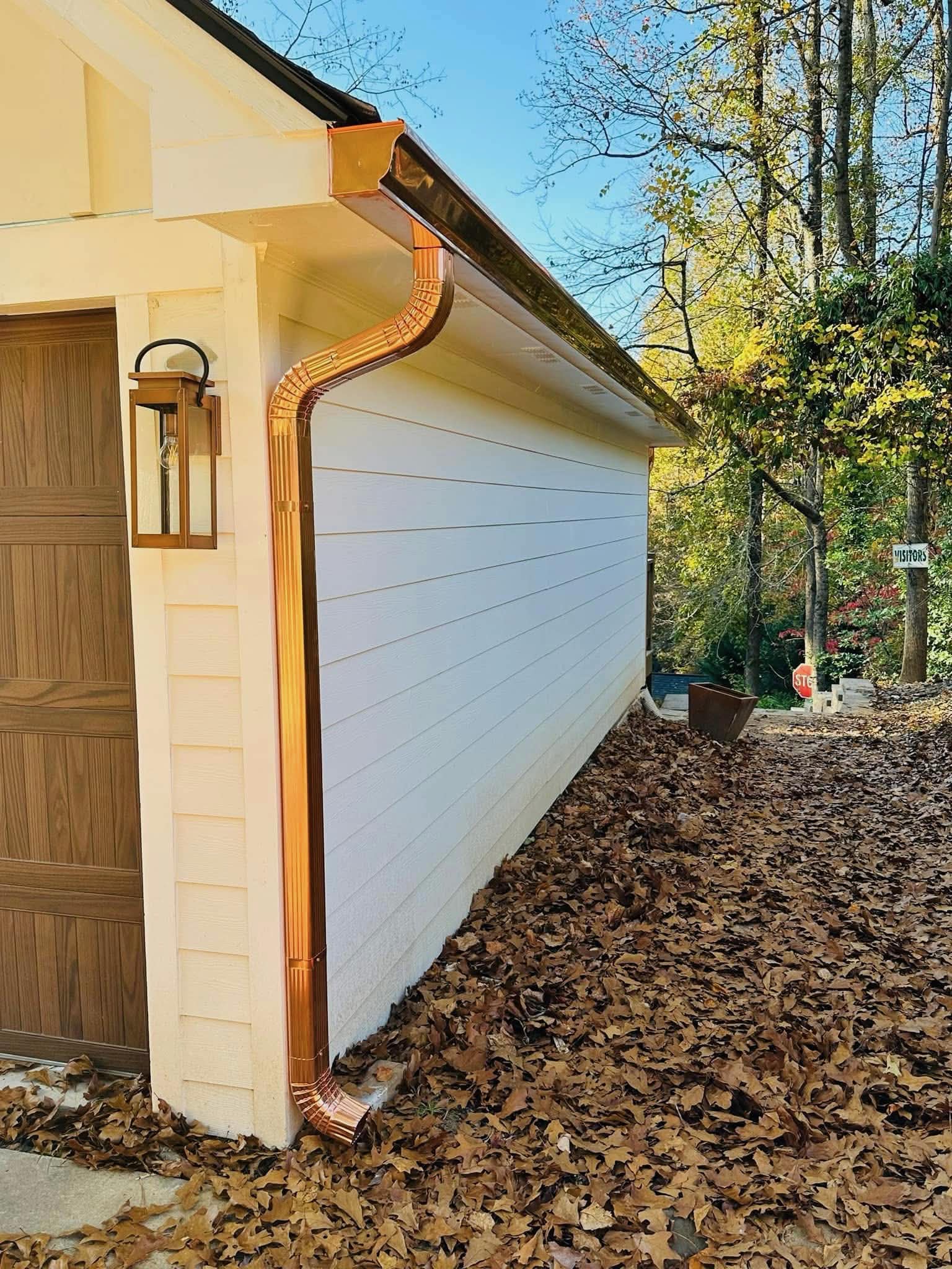 Premium copper half-round seamless gutter installed by A&M Seamless Gutters on a Metro Atlanta home